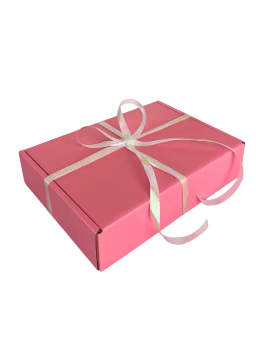 Geschenkbox  in Pink mit weißer Schlaufe 