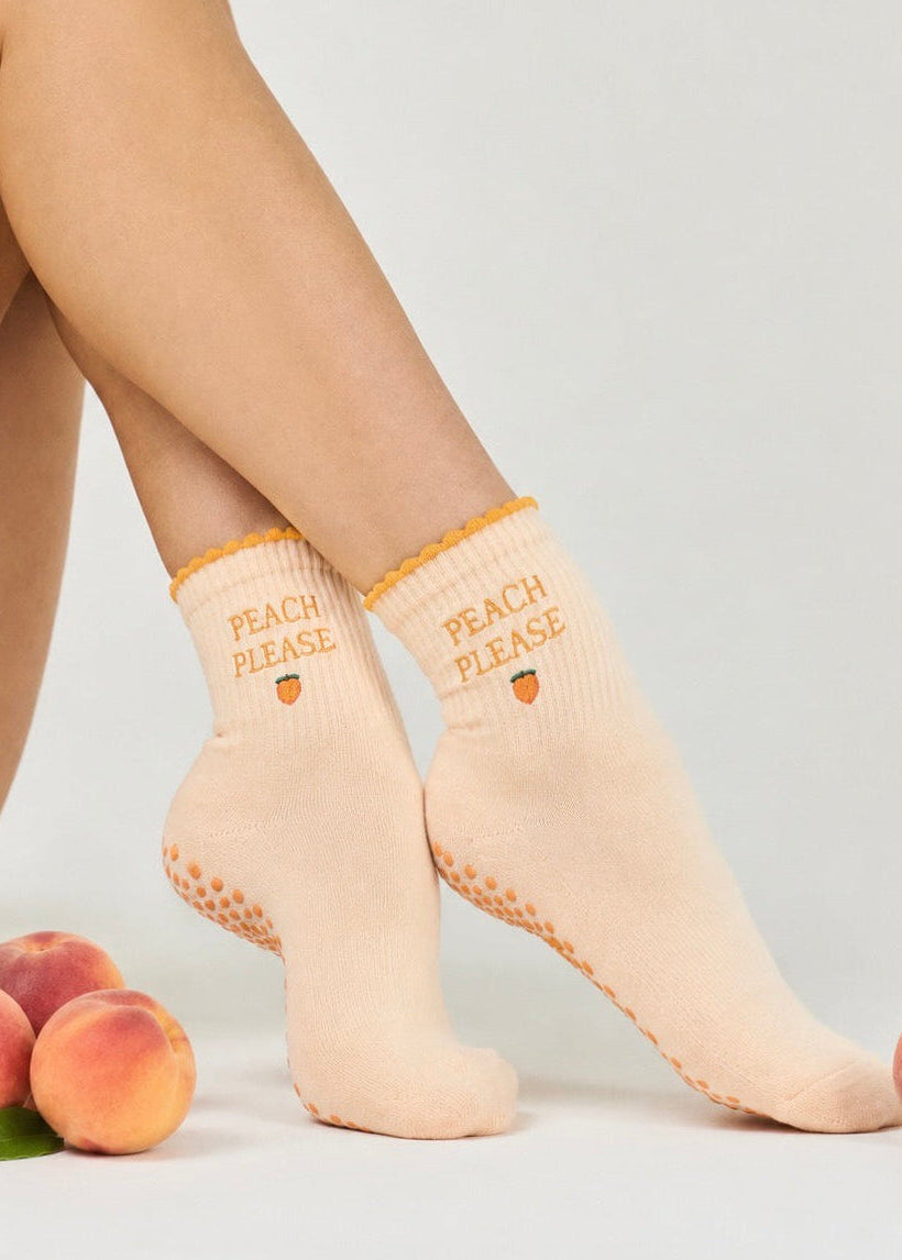 Orangene Pilates Socken mit der Aufschrift "Peach Please"